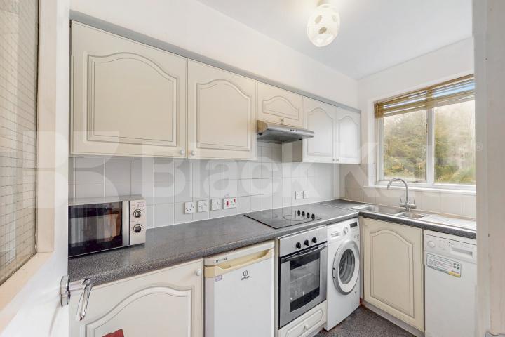 Top floor private development with charming balcony, communal gardens & parking Towergate , Pages Walk 